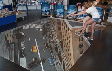 Levensgroot 3D kunstwerk in Amsterdam van Man on a Ledge.